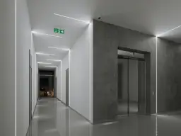 Nowoczesny korytarz z windą, gdzie profil led podtynkowy aranżacje tworzy minimalistyczny, elegancki efekt.