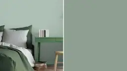 Sypialnia w odcieniach zieleni, z zielonym łóżkiem, biurkiem i narzutą. Magnat odcienie zieleni tworzą spokojną atmosferę.