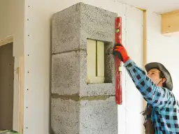 Jak obudować komin w kuchni: uniknij najczęstszych błędów i kosztów