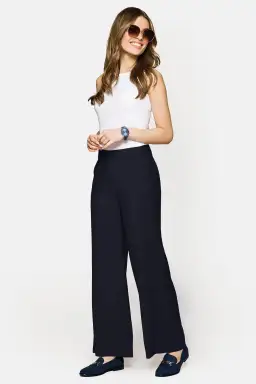 Jak uniknąć faux pas? Idealny outfit na imprezę firmową dla każdego dress code