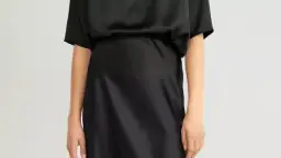 Estiliza tu falda negra larga: De día a noche, ¡siempre chic!