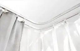 Karnisz na wykusz: typy, montaż i jak dopasować do wystroju wnętrza?