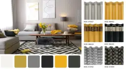 Szara kanapa w salonie z żółtymi akcentami. Inspiracje na zasłony: złote, czarne, szare, z frędzlami. Jakie zasłony do szarej kanapy?