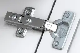 Jakie zawiasy do szafek górnych? Wybierz idealne podnośniki!