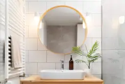 Jak dobrać kinkiet do okrągłego lustra: 5 kluczowych wskazówek