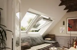 Okna dachowe plastik czy drewniane - co wybrać dla lepszej izolacji?