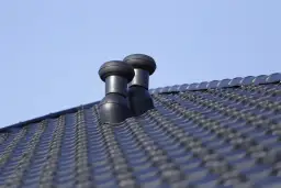 Kominki wentylacyjne na komin: skuteczna instalacja i korzyści