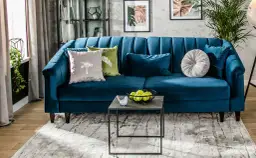 Jakie kolory najlepiej pasują do granatowej kanapy w Twoim wnętrzu