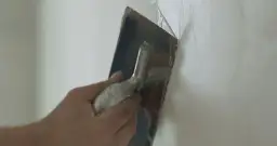 Jaki gips na tynk cementowo-wapienny? Wybierz najlepszy i uniknij błędów!