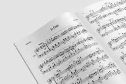 Nuty na pięciolinii utworu "El Coqui" dla pianisty solo.