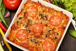 Najlepsze przepisy na zapiekankę z chleba tostowego, które zachwycą smakami