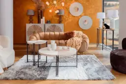 Jak urządzić przytulny salon? Odkryj sekrety ciepła i hygge!