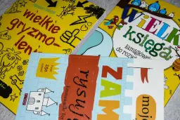 Książki z zadaniami dla 10 latka: "Wielka księga łamigłówek", "Wielkie gryzmolenie" i "Rysuj zamki".