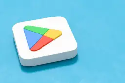 Ikona Sklepu Play na białym tle z niebieskim tłem.