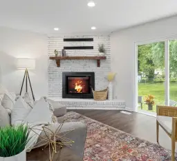 Jaką powierzchnię ogrzeje kominek 14 kW w różnych typach budynków?