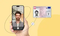Zdjęcie mężczyzny na ekranie telefonu obok dowodu osobistego.
