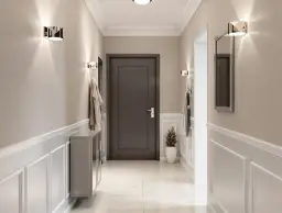 Eleganckie boazerie i tapeta w przedpokoju to świetne rozwiązanie, co na ścianę w przedpokoju żeby się nie brudziła.