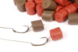 Jakie smaki pelletu na karpia naprawdę przyciągają ryby?