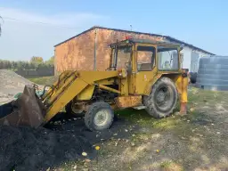 Koparko-ładowarka Ostrówek KTO-162: historia, specyfikacja, ceny