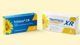 Dwa opakowania leku Trittico CR i Trittico XR z motywem słonecznika. Trittico CR 75 mg, Trittico XR 150 mg.