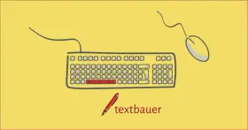 Ein Stift und eine Tastatur mit Maus, bereit für den textbauer, der mit einem geschützten Leerzeichen beginnt.