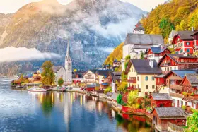 Scenic Hallstatt, Austria, a picturesque village nestled by a lake, perfect for a train journey from Prague.