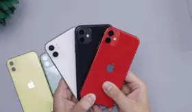 Ułatw sobie przejście z Androida na iOS dzięki tej aplikacji. Na zdjęciu iPhone'y w kolorach: żółtym, zielonym, białym, czarnym i czerwonym.