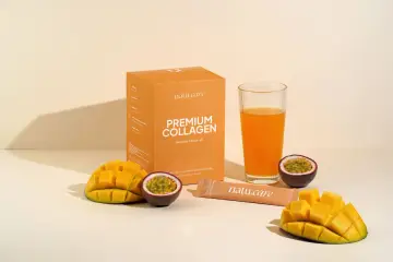 Pudełko "Premium Collagen" o smaku mango-marakuja, szklanka soku, kawałki mango i marakui. Idealny zestaw na orzeźwiający colladrop.