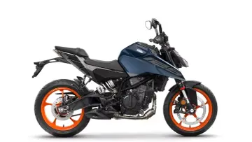 Niebieski KTM Duke 125 z pomarańczowymi felgami. Sprawdź jego dane techniczne i poczuj moc!