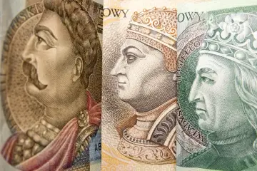 Fragmenty banknotów: portrety królów. Widoczny fragment banknotu 1000 zł z wizerunkiem Władysława Jagiełły.