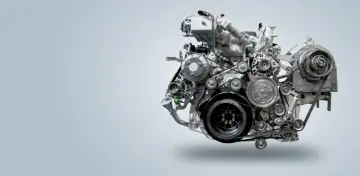 Złożony mechanizm silnika diesla z paskami i kołami pasowymi, ilustrujący, jak działa silnik diesla.