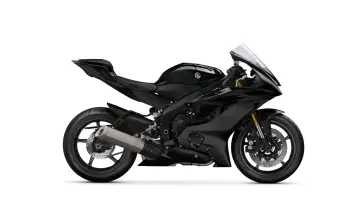 Czarny motocykl sportowy Yamaha R6, idealny do ścigania. Poznaj jego yamaha r6 dane techniczne.