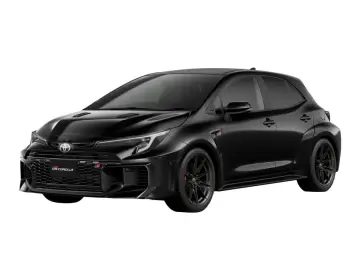 Czarna Toyota Corolla GR z agresywnym grillem i sportowymi felgami, gotowa do podboju dróg.