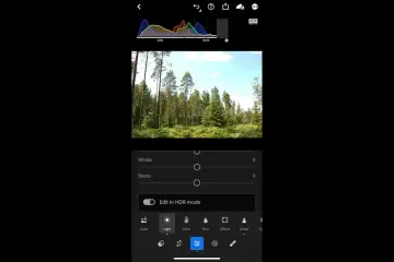 Skogslandskap med en histogramvy som visar SDR och HDR. En knapp för "Edit in HDR mode" är synlig.
