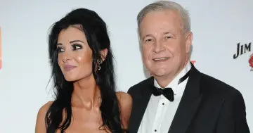 Apoloniusz Tajner z żoną. Wiek Apoloniusza Tajnera nie jest widoczny, ale widać jego uśmiech.