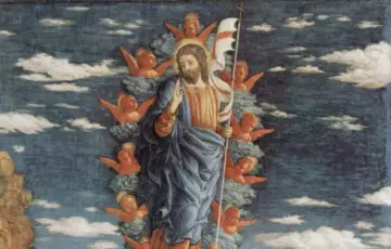 Wniebowstąpienie Pana Jezusa. Postać Jezusa w chwale, otoczona aniołkami, unosi się na tle błękitnego nieba z chmurami.
