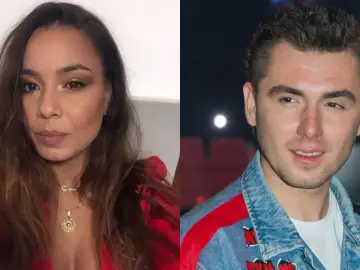 Kamil Bednarek z żoną, piękną kobietą w czerwonej sukience i artystą w dżinsowej kurtce.
