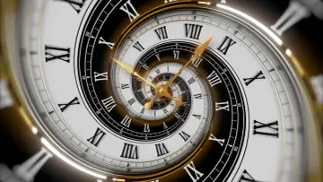 Złoty zegar z rzymskimi cyframi, tworzący spiralę nieskończoności. Symbolizuje 5 rok numerologiczny, czas zmian i rozwoju.