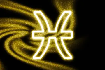 Symbol Ryb, 5 marca znak zodiaku, otoczony złotym, iskrzącym pyłem na czarnym tle.