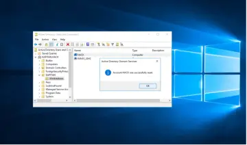 Okno "Active Directory Users and Computers" z komunikatem "Account HACK was successfully reset". To może być sygnał, że ktoś próbował uzyskać backdoor.