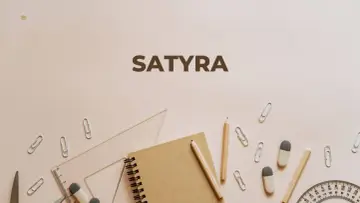 Szkolne przybory i napis "SATYRA" na jasnym tle. Może to być zapowiedź lekcji o literaturze, gdzie satyra odgrywa ważną rolę.