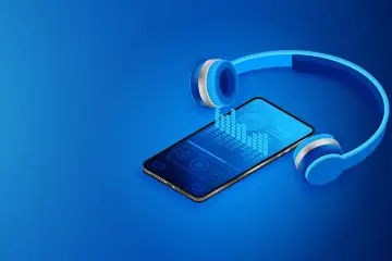 Słuchawki i smartfon z equalizerem. Idealne miejsce na muzyka do pobrania za darmo na telefon android.