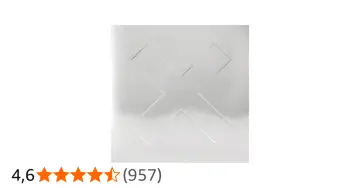 La couverture argentée minimaliste d'un des albums de The xx, avec un grand "X" en relief.