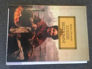 Okładka książki Stefana Żeromskiego "Ludzie bezdomni". Obraz przedstawia postać w brązowych szatach, niosącą kosz z pomarańczami.