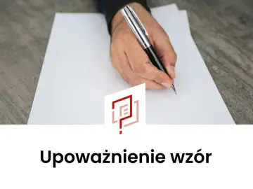Dłoń pisze długopisem na białej kartce. Dowiedz się, jak napisać upoważnienie, korzystając z gotowego wzoru.