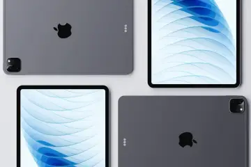 Cztery iPady w zbliżeniu, dwa z widocznym jabłkiem Apple, dwa z abstrakcyjną grafiką.