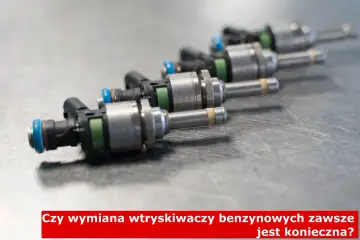 Rząd wtryskiwaczy benzynowych na metalowym blacie. Czy wymiana wtryskiwaczy benzynowych jest konieczna?