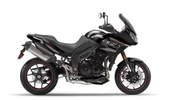 Czarny motocykl Triumph Tiger 1050. Poznaj jego dane techniczne i możliwości.
