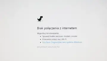Dinozaur z gry Chrome skacze nad napisem "Brak połączenia z internetem". UPC brak internetu, czas sprawdzić router.