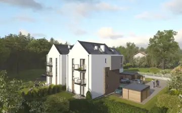 Nowoczesny dom z keramzytu, otoczony zielenią. Czy wady tego materiału są widoczne?